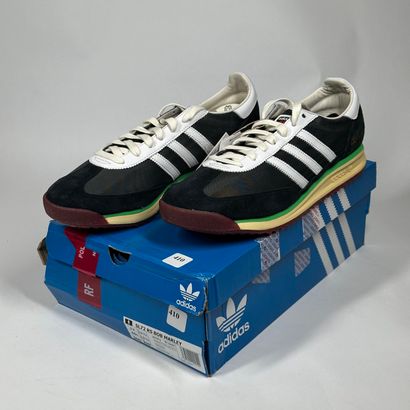 ADIDAS
A pair of low-top sneakers,
Model...