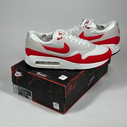 NIKE 
A pair of low-top sneakers,
Model :...