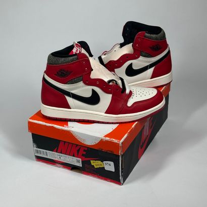 374
NIKE / JORDAN
A pair of high-top sneakers,
Model...