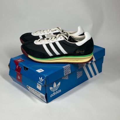 ADIDAS
A pair of low-top sneakers,
Model...