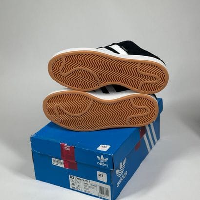 452
ADIDAS
A pair of low-top sneakers,
Model...