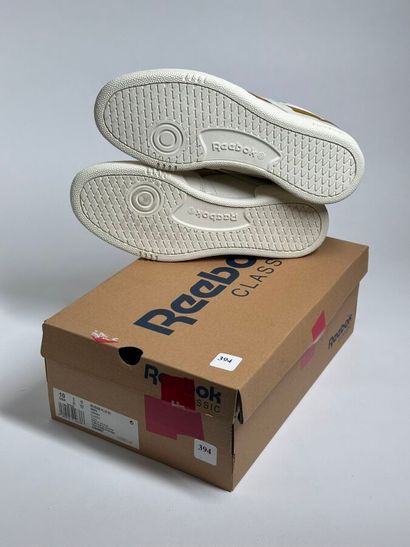 REEBOK
A pair of low-top sneakers,
Model...