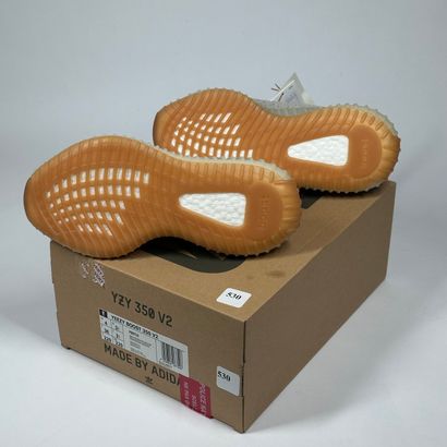 ADIDAS / YEEZY
A pair of low-top sneakers,
Model...