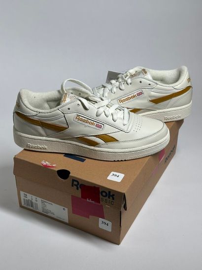REEBOK
A pair of low-top sneakers,
Model...