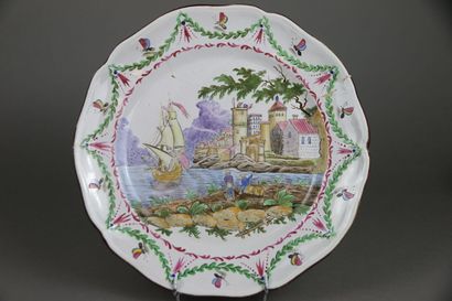 LES ISLETTES
Plat en faïence émaillée polychrome...