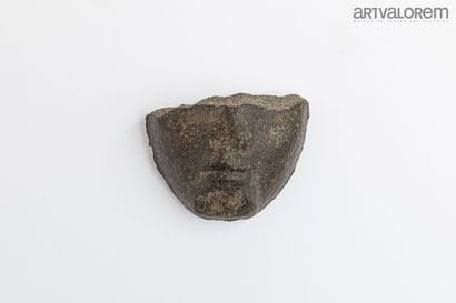 EGYPT, Ramesside period
Lower part of a face.
Granite...