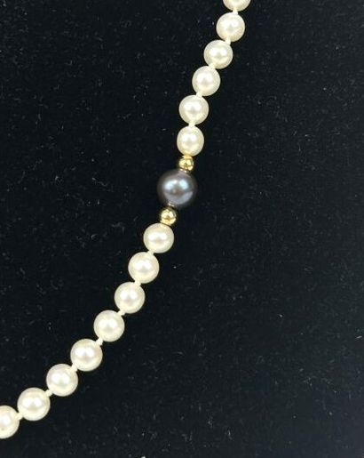 Necklace of white cultured pearls alternating...