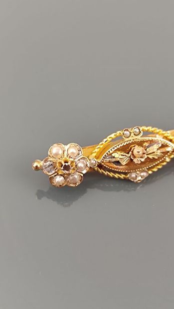 Barrette brooch in yellow gold 750°/°° decorated...