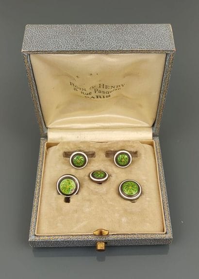 White and green enamelled metal set with...