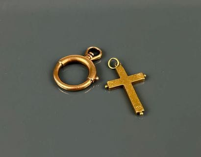 Cross pendant and lobster clasp in yellow...