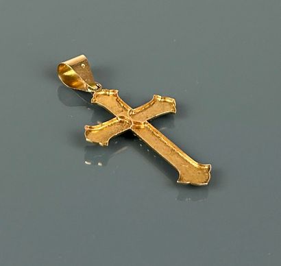 Latin cross in yellow gold 750°/°° engraved...