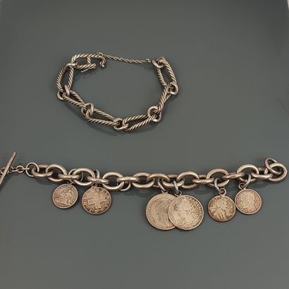 Silver bracelet with cord and curb chain...