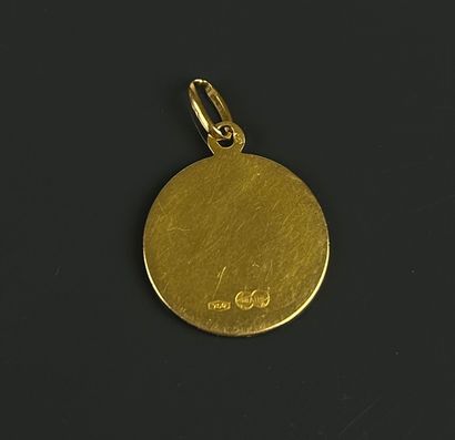 Engraved religious medal of the Virgin Mary...