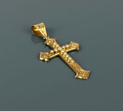 Latin cross in yellow gold 750°/°° engraved...