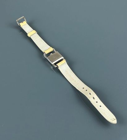 Stirrup bracelet watch in 750°/°° white gold...