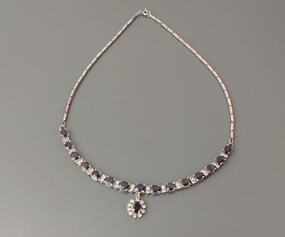 Silver necklace with baguette links set with...