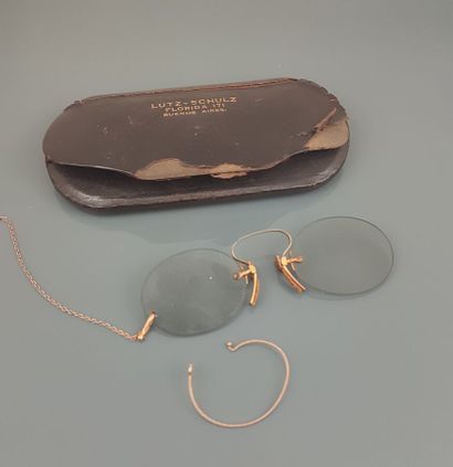 A pair of pince-nez sunglasses with oval...