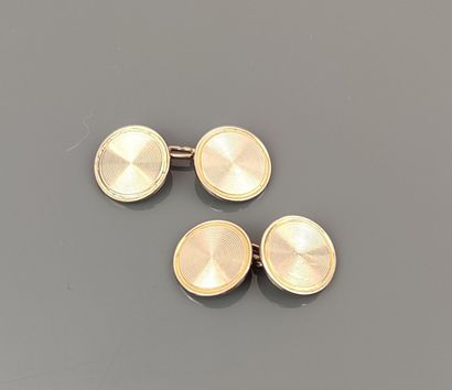 Pair of white and yellow gold 750 °/°° cufflinks...
