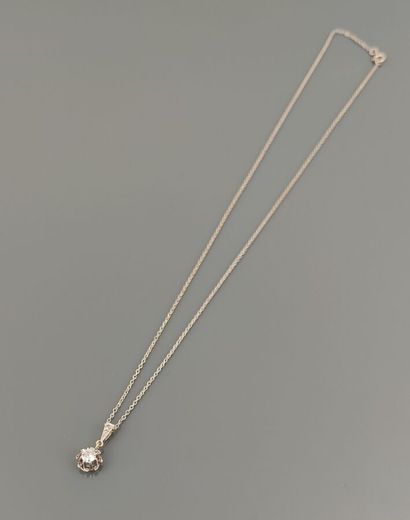 Chain and pendant in 750°/°° white gold adorned...