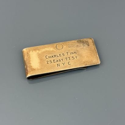 Ticket clip in the form of an envelope in...