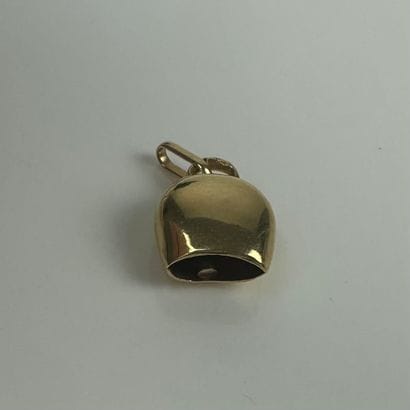 Bell-shaped charm in yellow gold 750°/°°.
Length:...