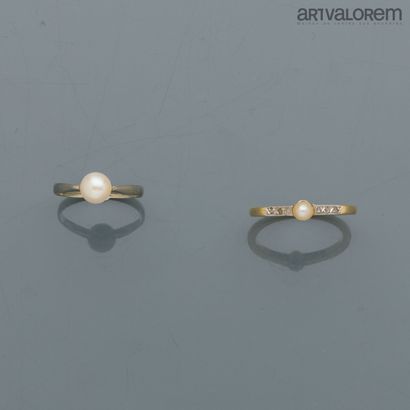 Ring in yellow and white gold 750°/°° centered...