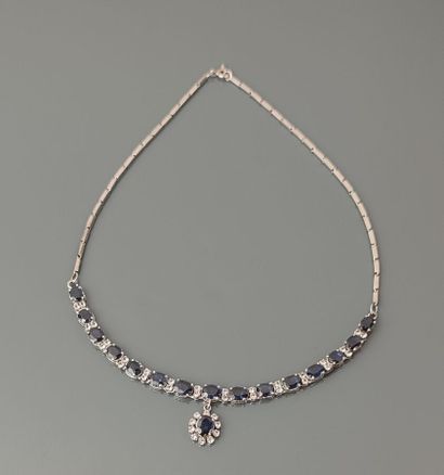 Silver necklace with baguette links set with...