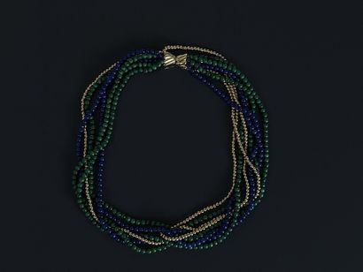 Collier en or 585°/°° à 7 rangs de perles...