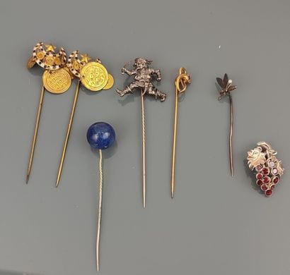 Six tie pins 
- in silver-plated metal adorned...