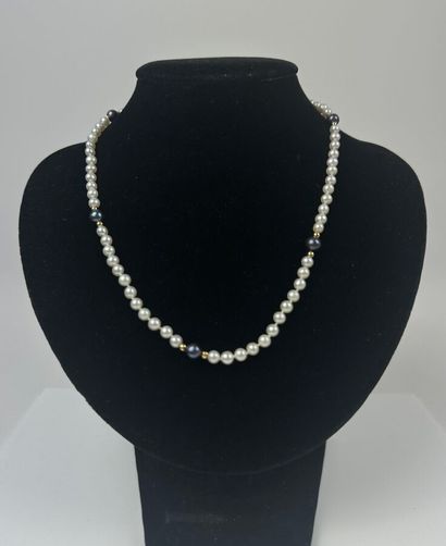 Necklace of white cultured pearls alternating...