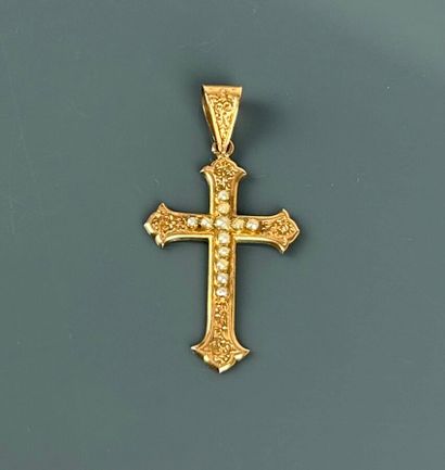 Latin cross in yellow gold 750°/°° engraved...