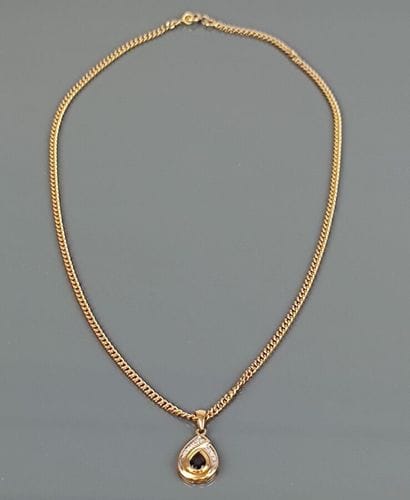 750°/°° yellow gold curb chain with pin clasp....