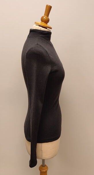 NINA RICCI
Pull à col roulé gris en laine,...