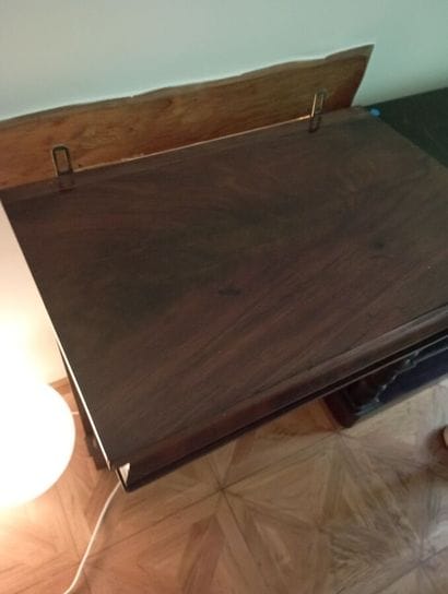 Console et son miroir à fronton en acajou,
XIXème...