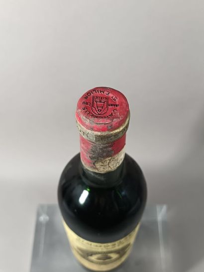 Une bouteille Château ANGÉLUS 1986 - 1er...