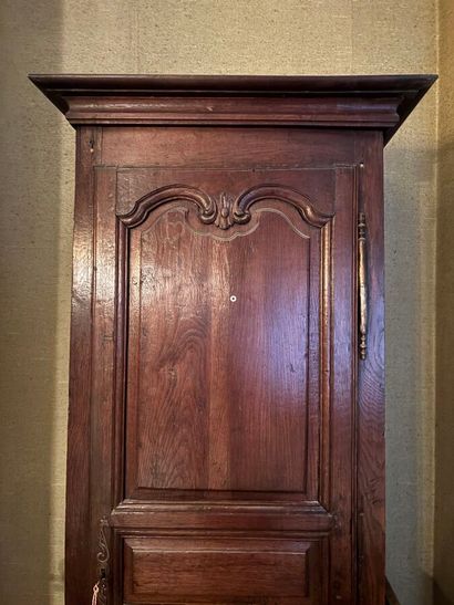 Bonnetiere in molded and carved natural wood...
