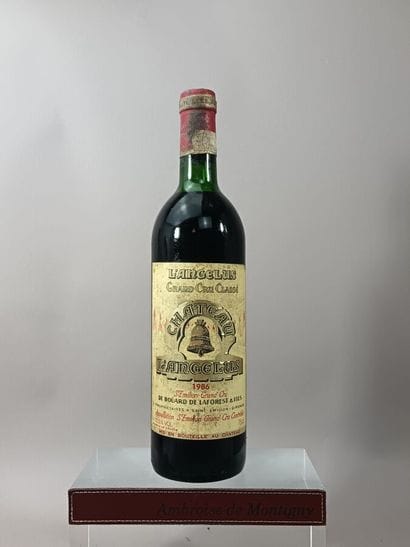 Une bouteille Château ANGÉLUS 1986 - 1er...