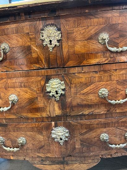 Veneered chest of drawers opening with three...