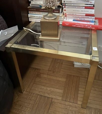 Two square end tables in gilded chromed metal.
Glass...