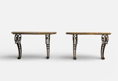 Pair of gilded wrought-iron consoles, curved...