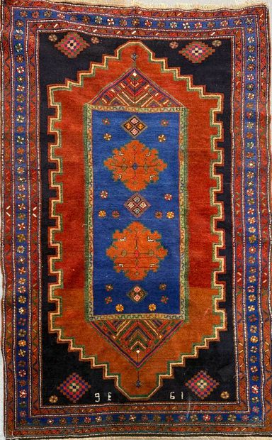 Persian wool carpet decorated with mirahb,...