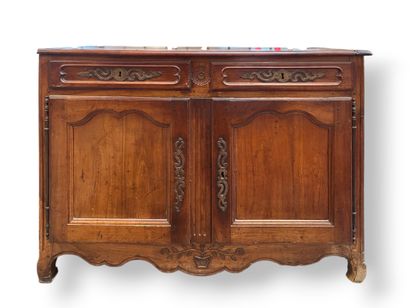Moulded walnut sideboard, carved with rosette,...