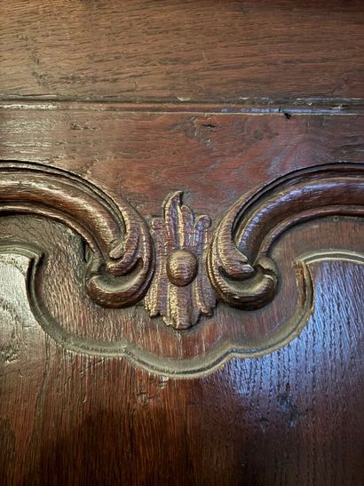 Bonnetiere in molded and carved natural wood...