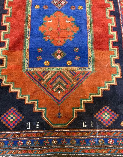 Persian wool carpet decorated with mirahb,...