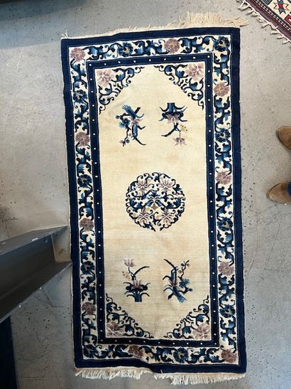 China, 20th century,
Wool carpet, blue floral...