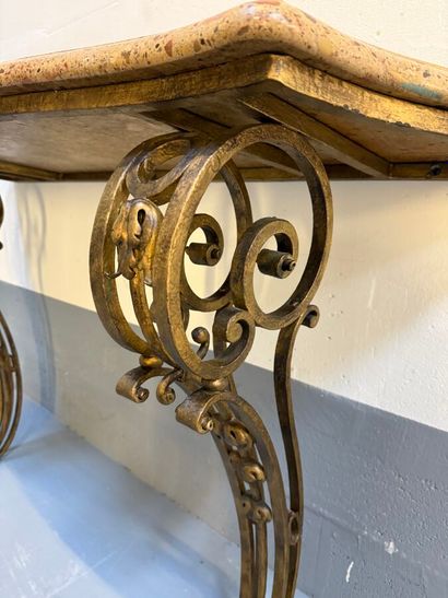 Pair of gilded wrought-iron consoles, curved...