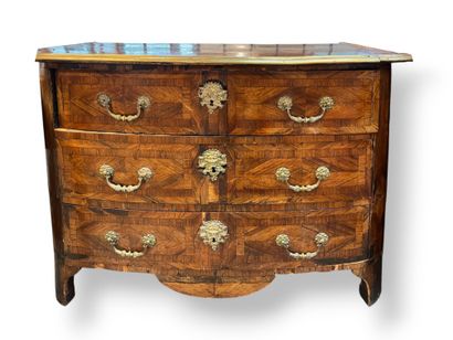 Veneered chest of drawers opening with three...