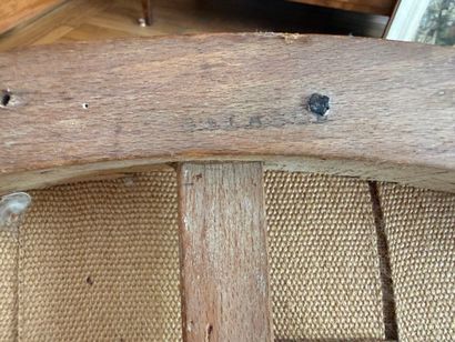 Armchair with a gondola-style backrest made...