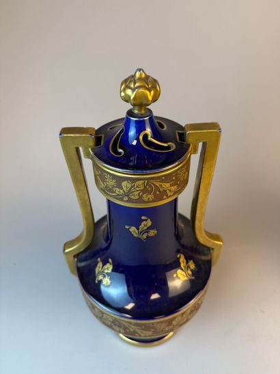 Pair of potpourri vases on pedestals with...