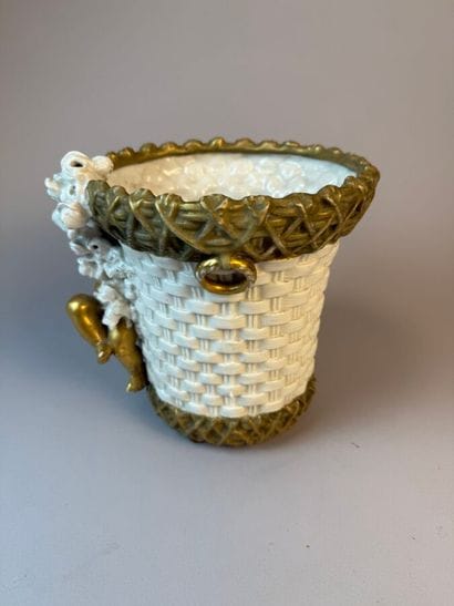 Earthenware planter with a wickerwork pattern,...